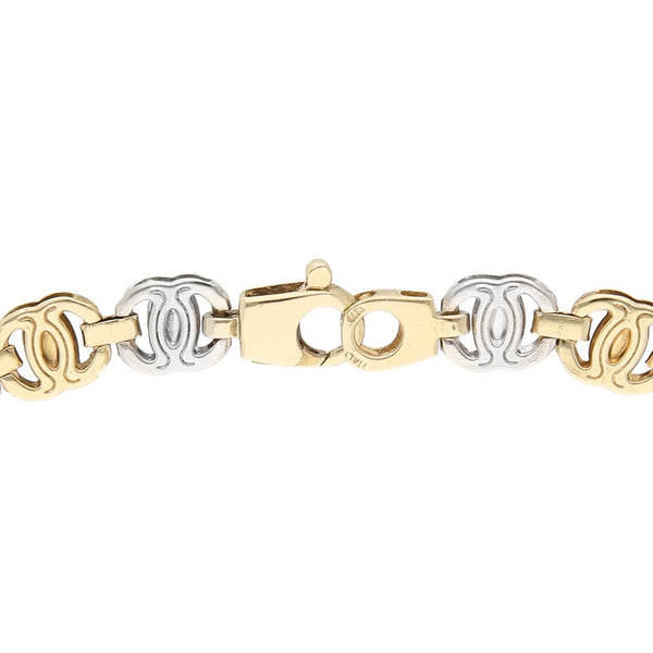 Pulsera eslabón articulado en oro tres tonos 14 kilates.