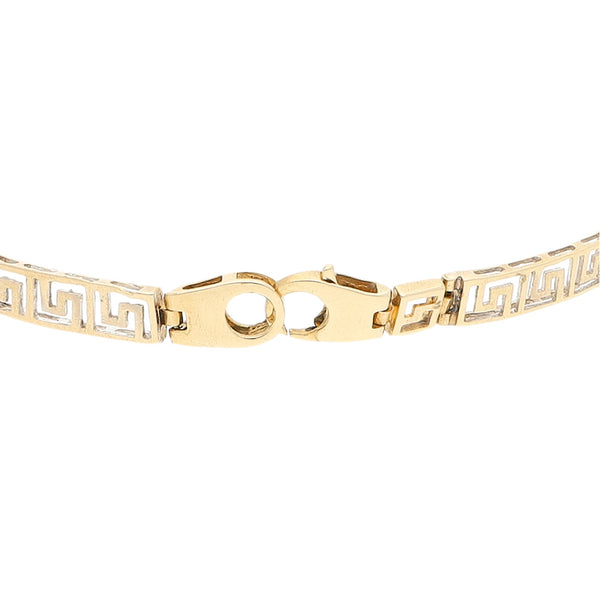 Pulsera eslabón calado platinado motivo grecas en oro amarillo 14 kilates.