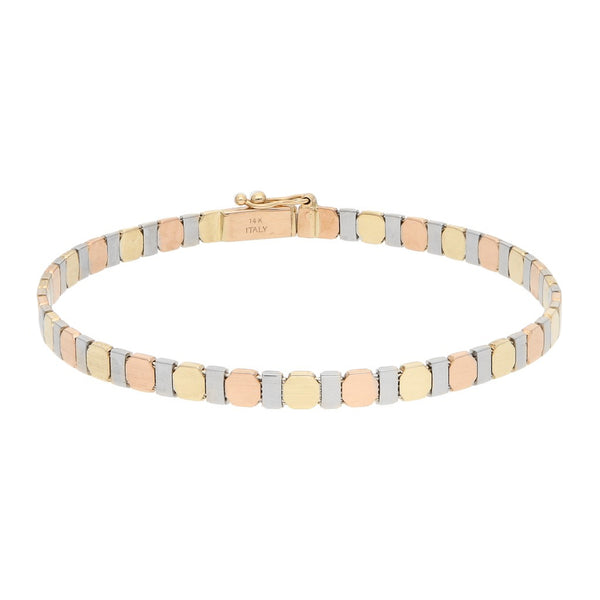 Pulsera eslabón articulado en oro tres tonos 14 kilates.