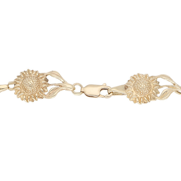 Pulsera eslabón articulado motivo flor en oro amarillo 14 kilates.