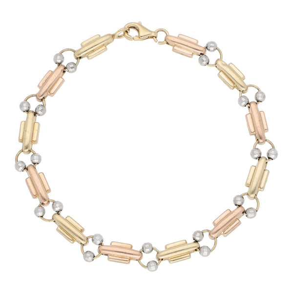 Pulsera eslabón combinado con aplicaciones en oro dos tonos 14 kilates.