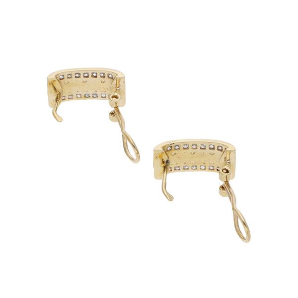 Juego de anillo y aretes diseño especial con sintéticos en oro amarillo 14 kilates.