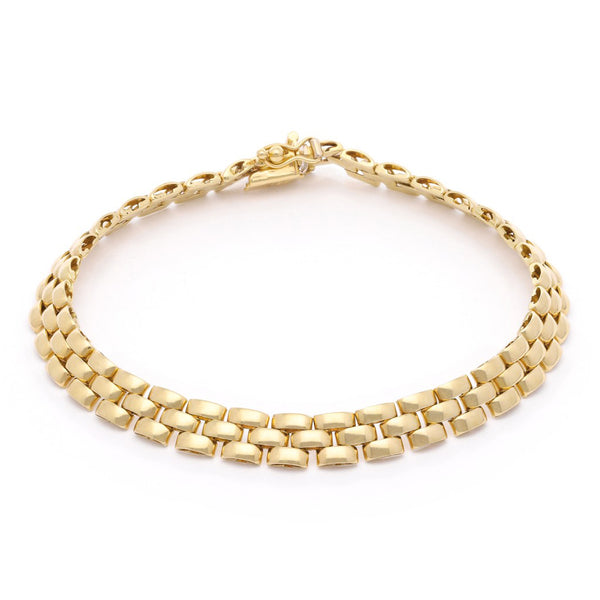 Pulsera eslabón articulado en oro amarillo 14 kilates.