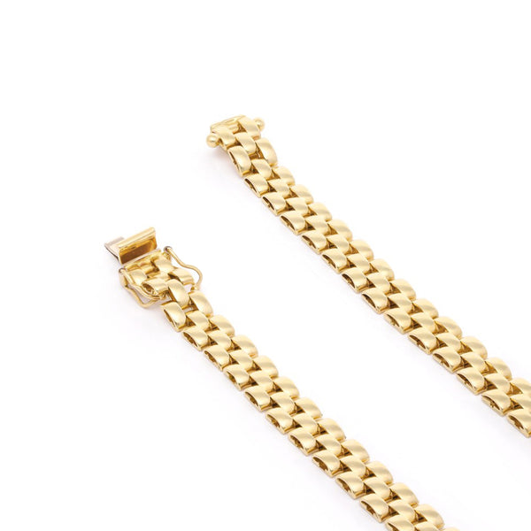 Pulsera eslabón articulado en oro amarillo 14 kilates.