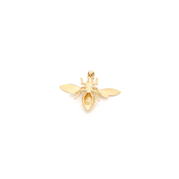 Dije diseño especial motivo abeja en oro amarillo 14 kilates.