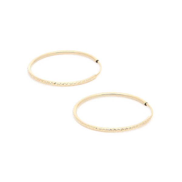 Arracadas facetadas en oro amarillo 14 kilates.