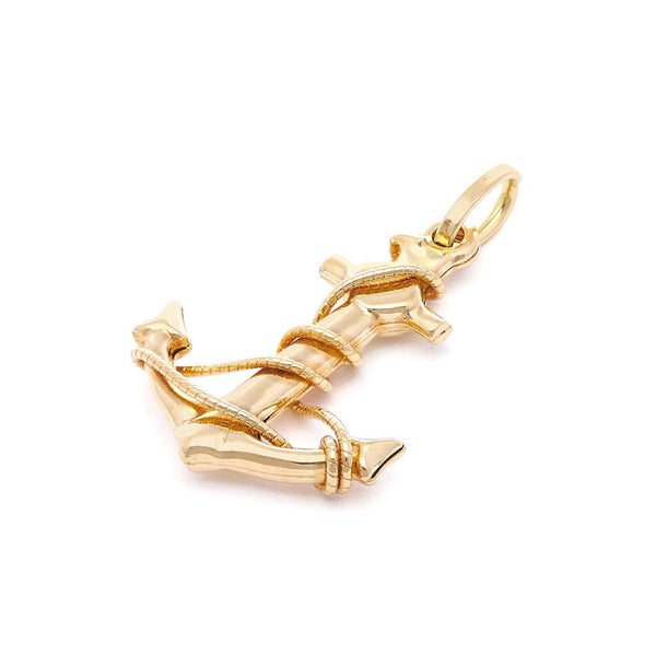 Dije diseño especial motivo ancla en oro amarillo 14 kilates.