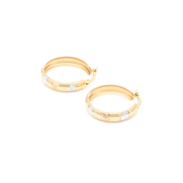 Arracadas facetadas en oro amarillo 14 kilates.