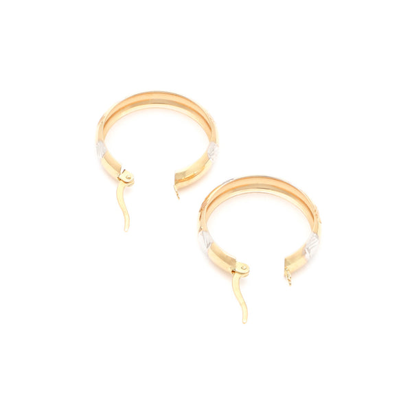 Arracadas facetadas en oro amarillo 14 kilates.