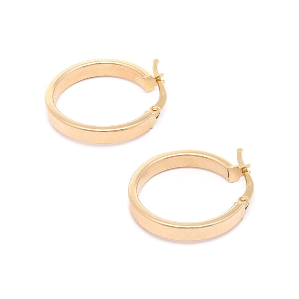 Arracadas lisas en oro amarillo 14 kilates.