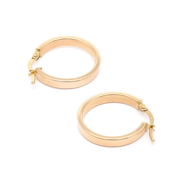 Arracadas lisas en oro amarillo 14 kilates.