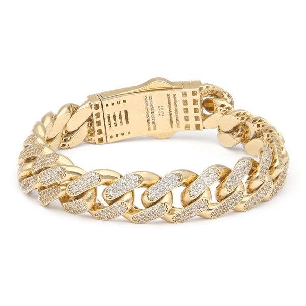 Pulsera eslabón barbado con circonias en oro amarillo 14 kilates.