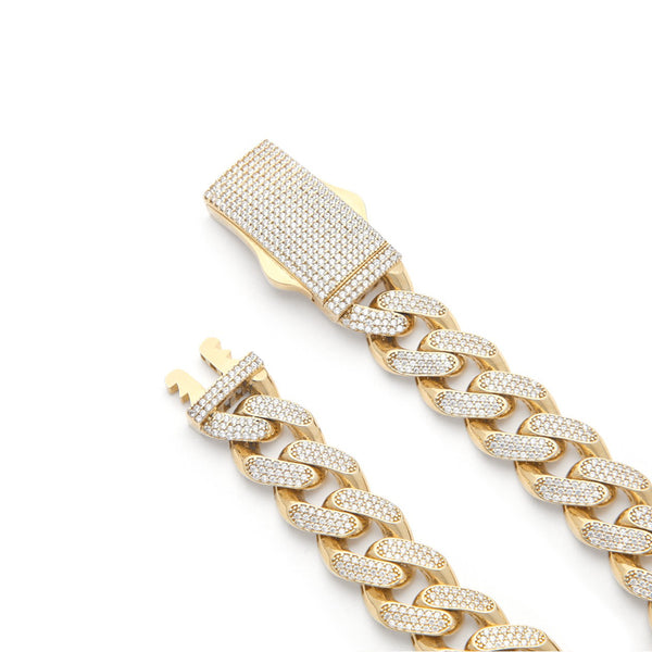 Pulsera eslabón barbado con circonias en oro amarillo 14 kilates.