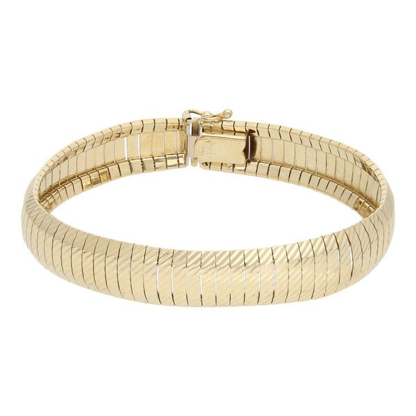 Pulsera eslabón laminado en oro amarillo 14 kilates.