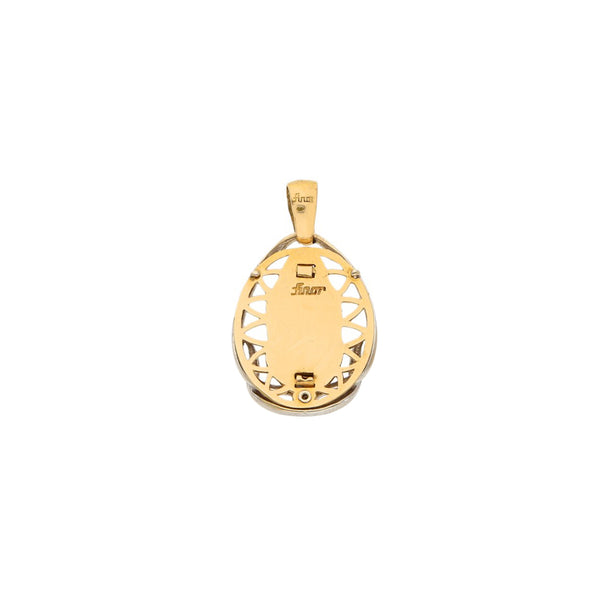 Medalla diseño especial con circonia motivo Virgen de Guadalupe en oro dos tonos 18 kilates.