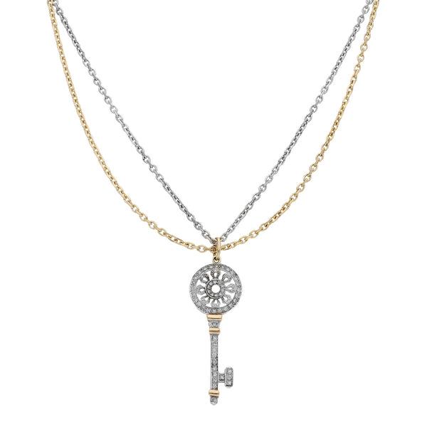 Gargantilla de dos hilos eslabón cruzado y dije diseño especial con diamantes motivo llave en oro dos tonos 12 kilates.