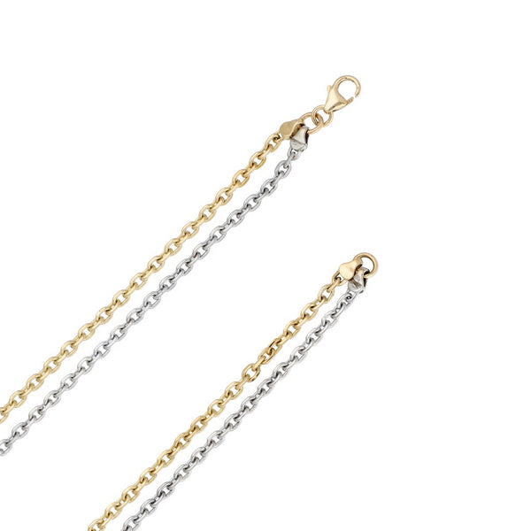Gargantilla de dos hilos eslabón cruzado y dije diseño especial con diamantes motivo llave en oro dos tonos 12 kilates.