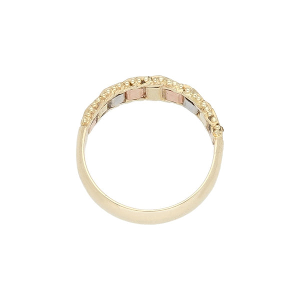 Anillo boleado en oro tres tonos 14 kilates.