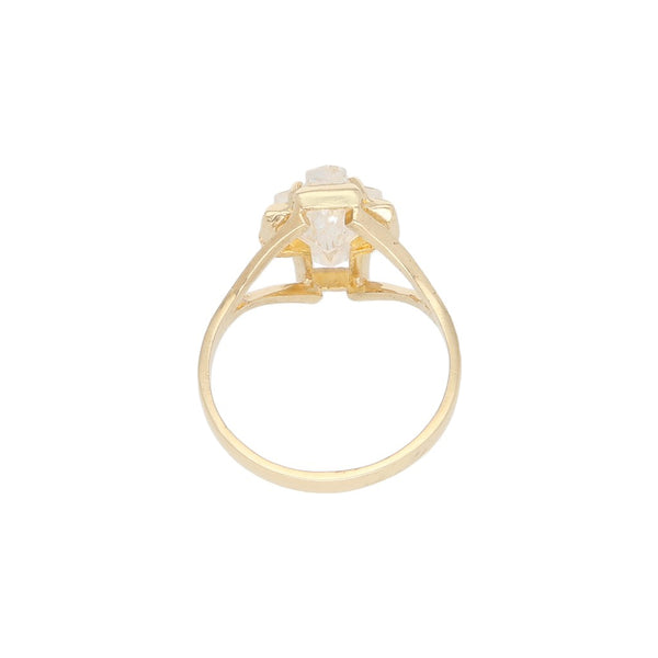 Anillo diseño especial con sintético motivo cruz en oro amarillo 12 kilates.