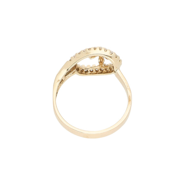 Anillo calado con sintéticos en oro amarillo 12 kilates.