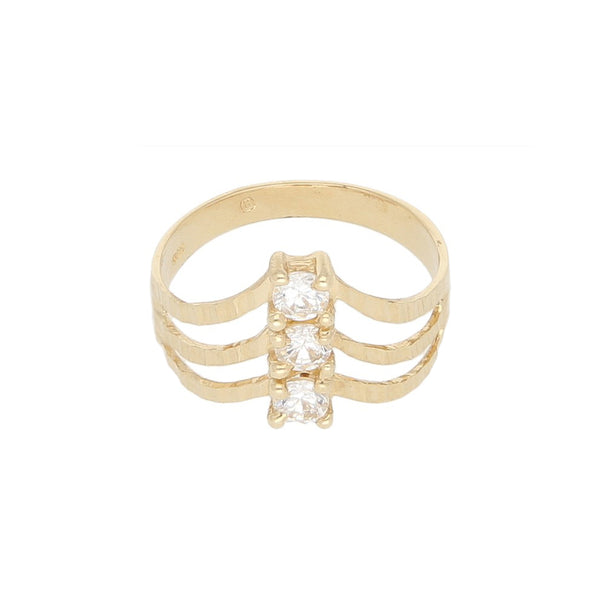 Anillo calado con sintéticos en oro amarillo 14 kilates.