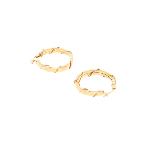 Arracadas lisas con aplicaciones en oro amarillo 14 kilates.