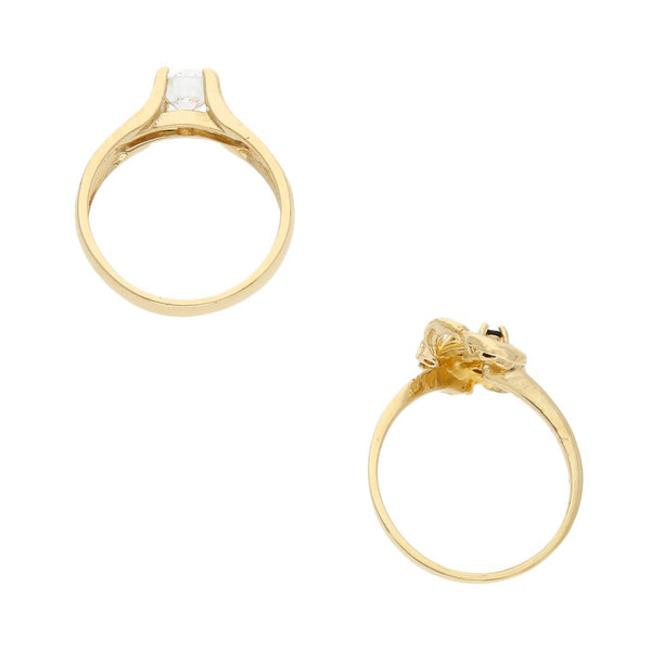 Dos anillos hechuras diferentes con sintéticos en oro amarillo 14 kilates.