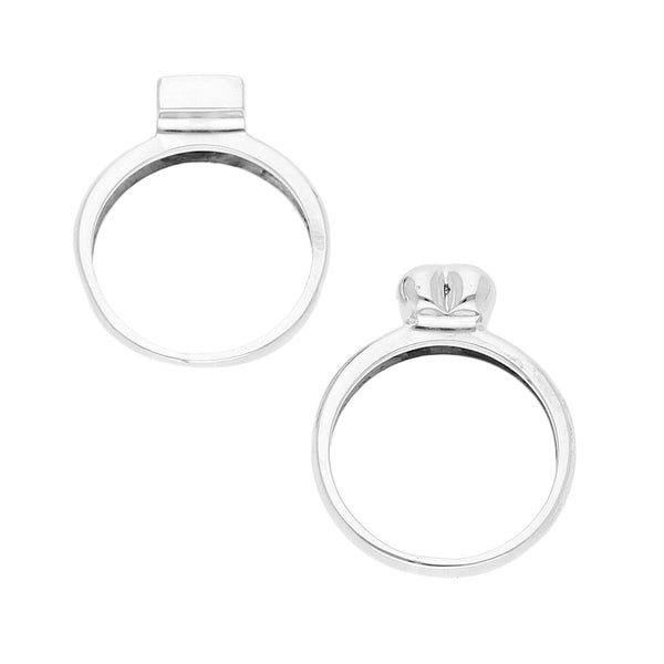 Dos anillos diseño especial motivo corazón y cuadro con diamantes en oro blanco 14 kilates.