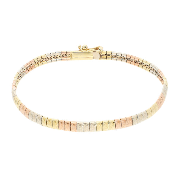 Pulsera eslabón laminado en oro tres tonos 14 kilates.