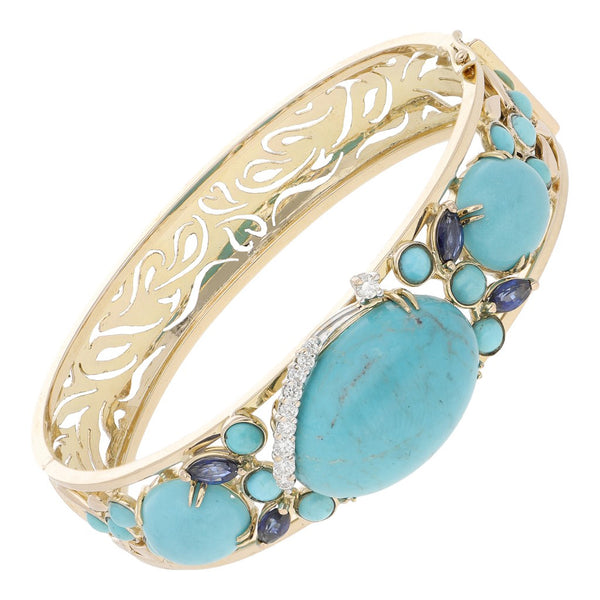 Pulsera de arillo calada con diamantes, zafiros y turquesas en oro amarillo 14 kilates.