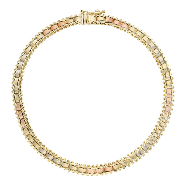 Pulsera eslabón boleado en oro tres tonos 14 kilates.