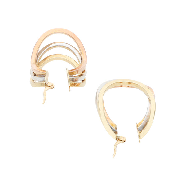 Arracadas diseño especial en oro tres tonos 14 kilates.