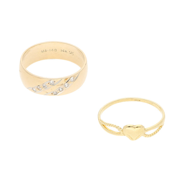 Dos anillos hechuras diferentes con circonias en oro amarillo 14 kilates.