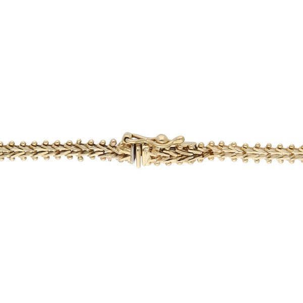 Pulsera eslabón boleado en oro tres tonos 14 kilates.