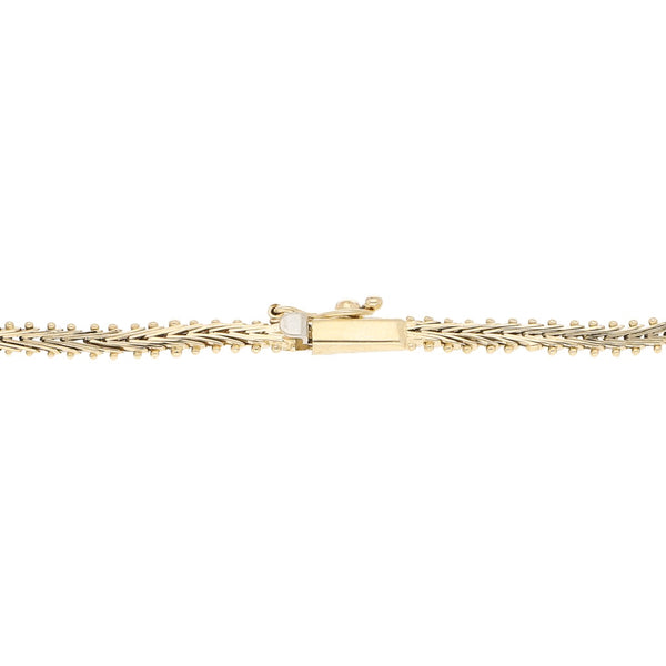 Pulsera eslabón boleado en oro tres tonos 14 kilates.