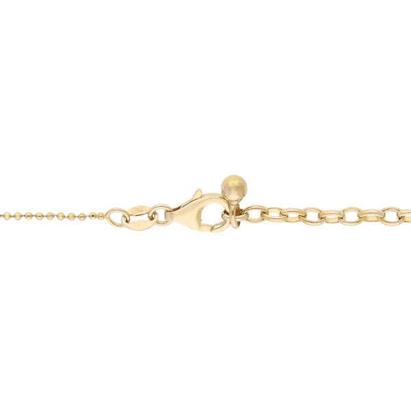 Pulsera con extensión de anillo eslabón boleado con colgante motivo aros en oro amarillo 14 kilates.