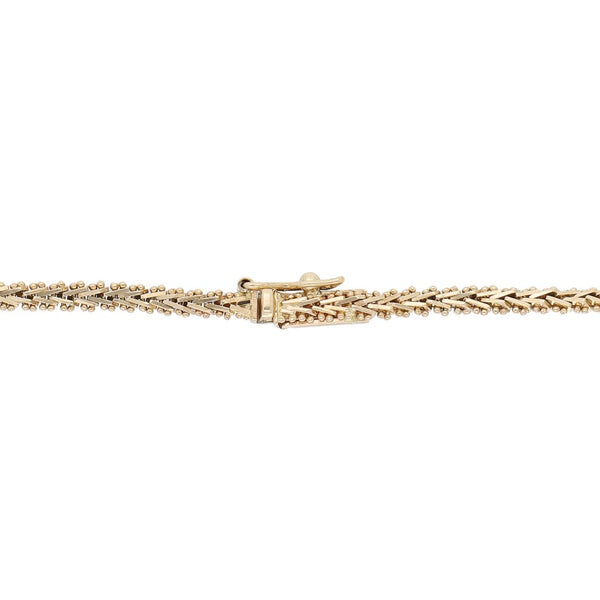Pulsera eslabón boleado en oro amarillo 14 kilates.