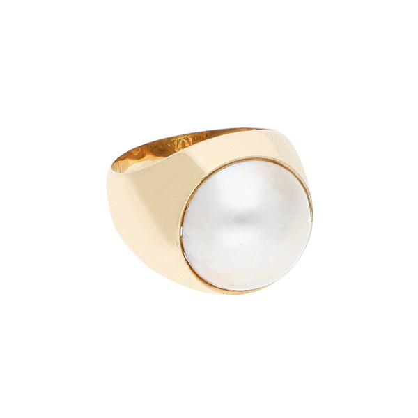 Anillo diseño especial con perla en oro amarillo 14 kilates.