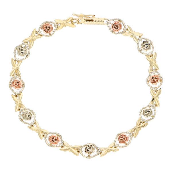 Pulsera eslabón combinado con aplicaciones motivo rosa en oro tres tonos 14 kilates.
