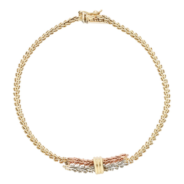 Pulsera eslabón boleado en oro tres tonos 14 kilates.