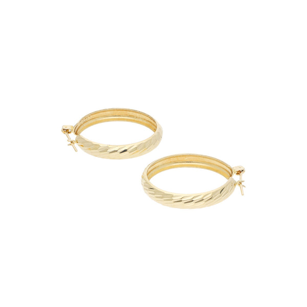Arracadas facetadas en oro amarillo 14 kilates.