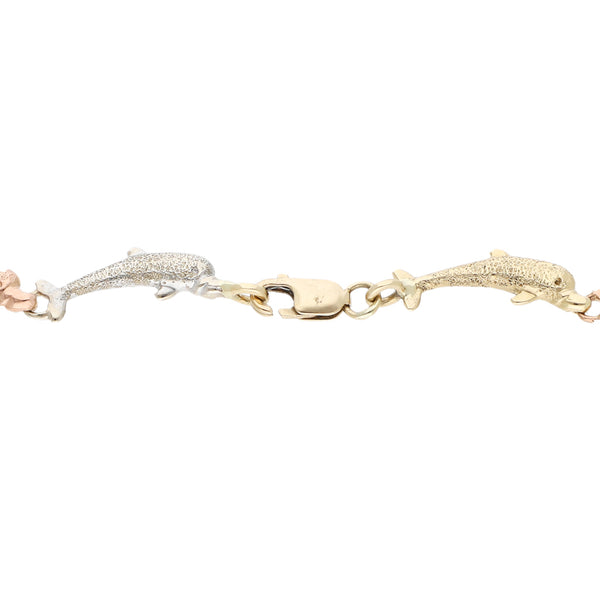 Pulsera eslabón encontrado motivo delfín en oro tres tonos 14 kilates.
