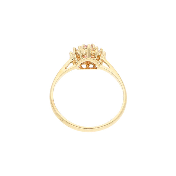 Anillo diseño especial motivo corazón con sintéticos en oro amarillo 14 kilates.