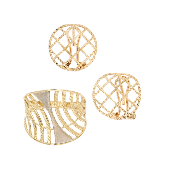 Juego de anillo y aretes calados en oro amarillo 14 kilates.