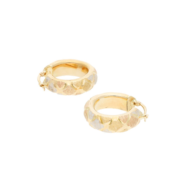 Arracadas huecas en oro amarillo 14 kilates.