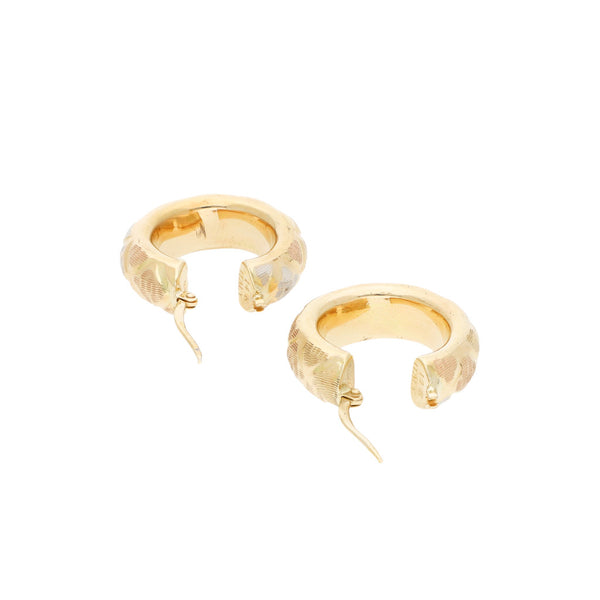 Arracadas huecas en oro amarillo 14 kilates.