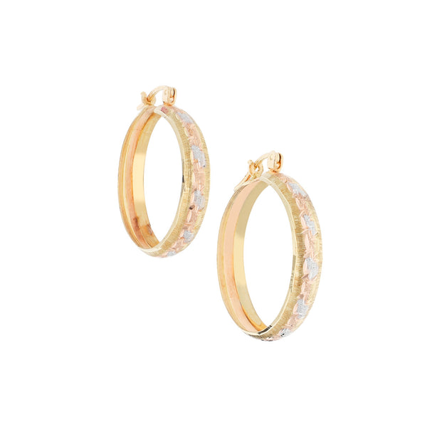 Arracadas labradas en oro amarillo 12 kilates.