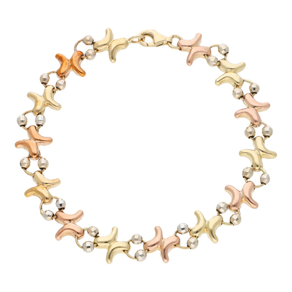Pulsera eslabón combinado con aplicaciones en oro tres tonos 14 kilates.