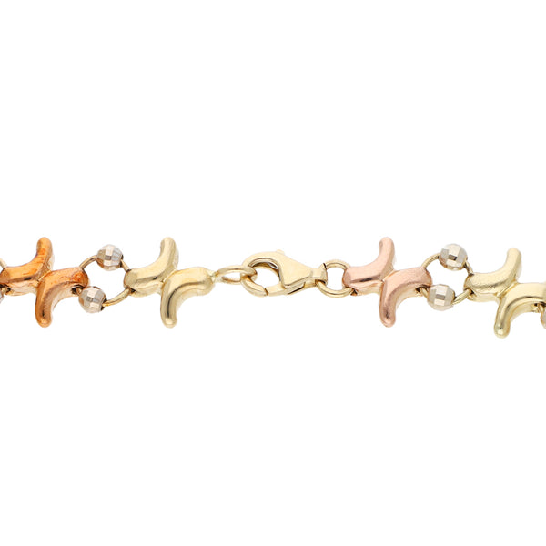 Pulsera eslabón combinado con aplicaciones en oro tres tonos 14 kilates.