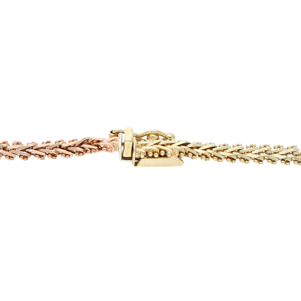 Pulsera eslabón boleada en oro tres tonos 14 kilates.